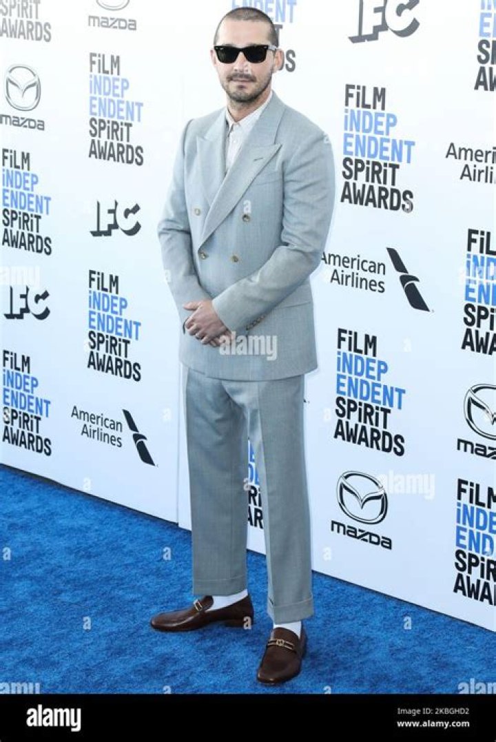Actor Shia LaBeouf wearing Gucci with Ray-Ban sunglasses arrives at the 2020 Film Independent Spirit...