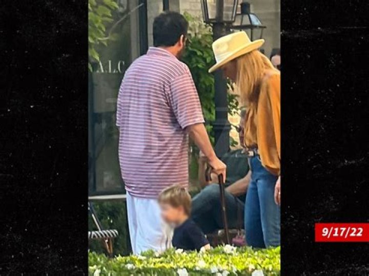 
Adam Sandler Walks With a Cane After Undergoing Hip Surgery 