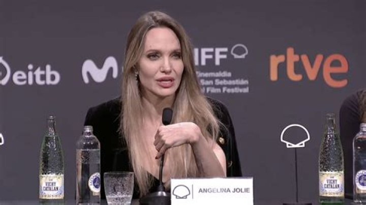 Angelina Jolie speaks to the press after a NATO meeting in Brussels