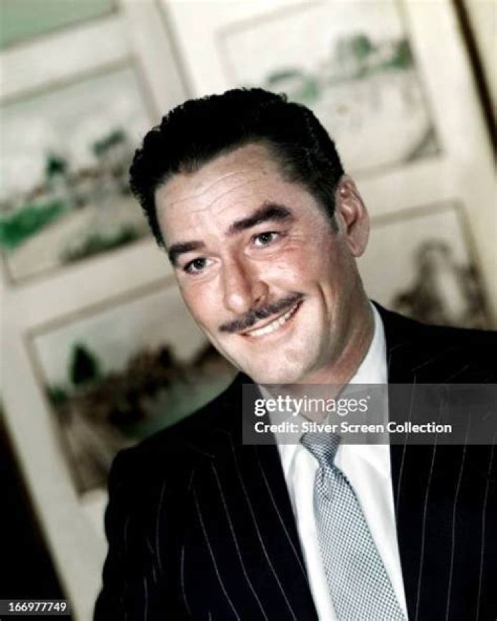 Flynn & Daughters circa 1957: Australian-born actor Errol Flynn (1909-1959) poses with his daughters, Rory (L) and Deirdre, on his arms as they attend a formal event. (Photo by Hulton Archive/Getty Images)