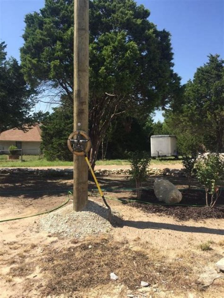 How can I hide my power pole in my yard?