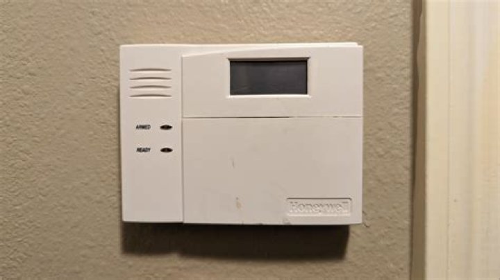 How do you remove an old wired alarm system?