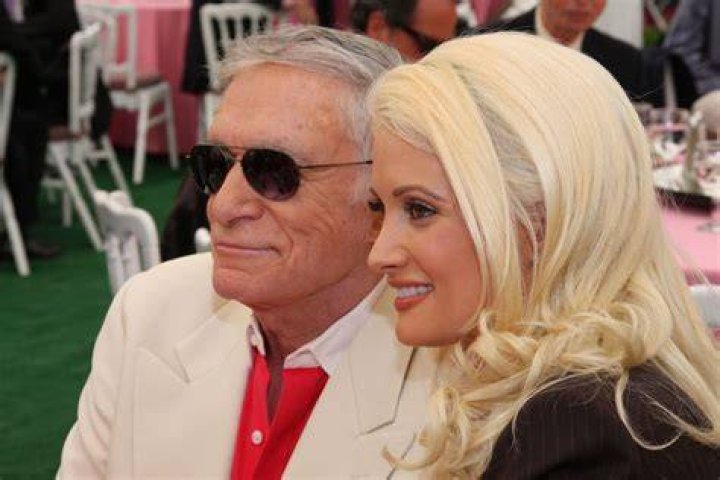 Hugh Hefner is telling friends he should have married Holly, but she’s moved on