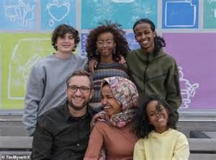 
Ilhan Omar’s husband and family are with Tim Mynett as she wins the house primary. 