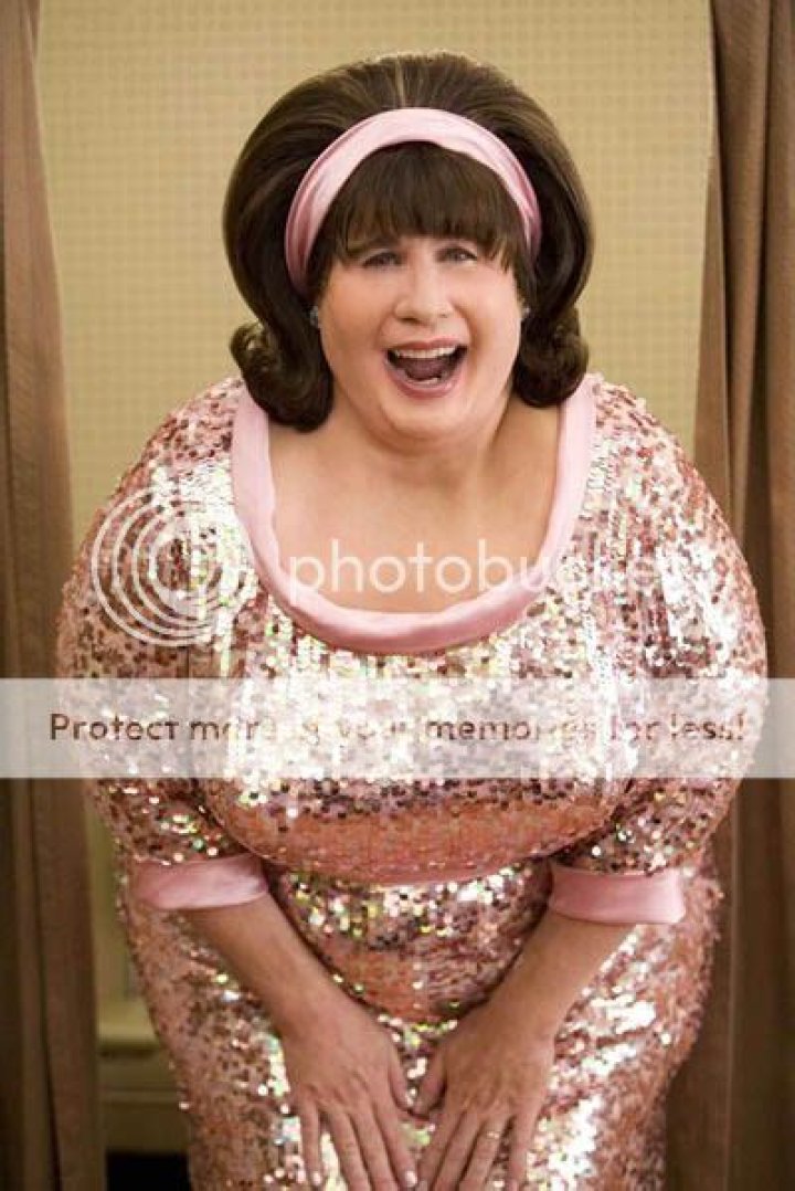 John Travolta plays a woman really, really well