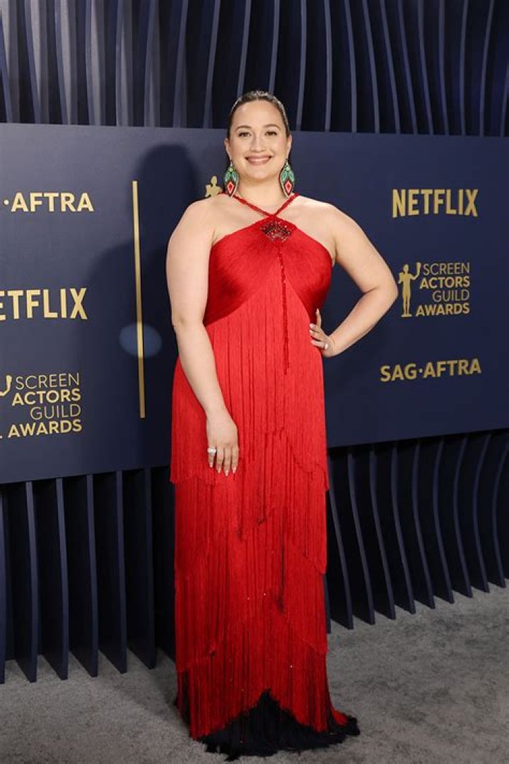 Lily Gladstone wore Armani as she picked up her SAG Award for Best Actress