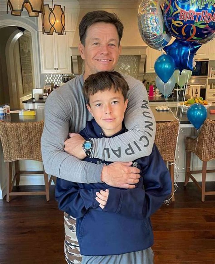 Mark Wahlberg watches his kids sports games from his car