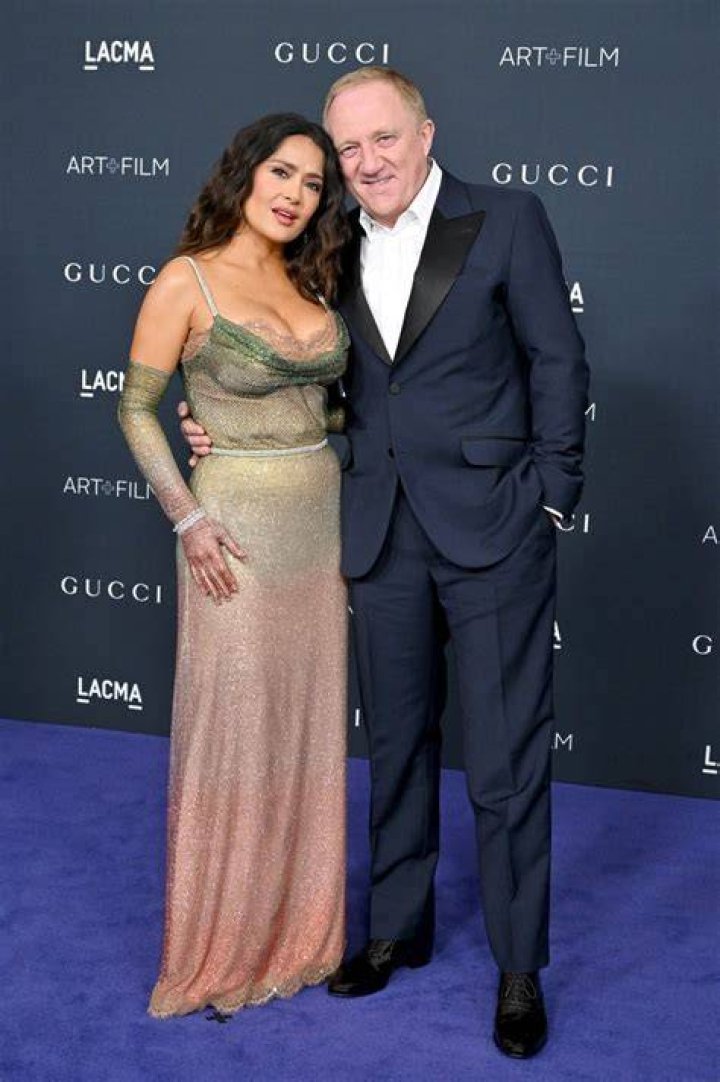 Salma Hayek inks a huge Sunflower tattoo on her chest, tropical vacation bikini photos!