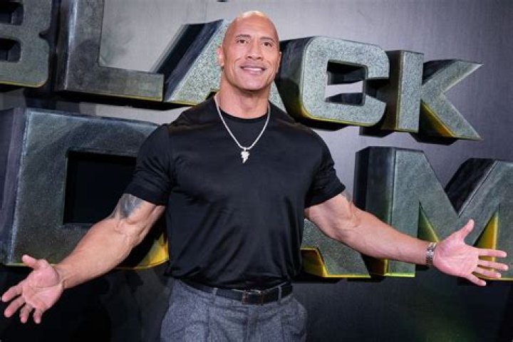 The Rock surprises an LA tour bus in his neighborhood, thrills fans