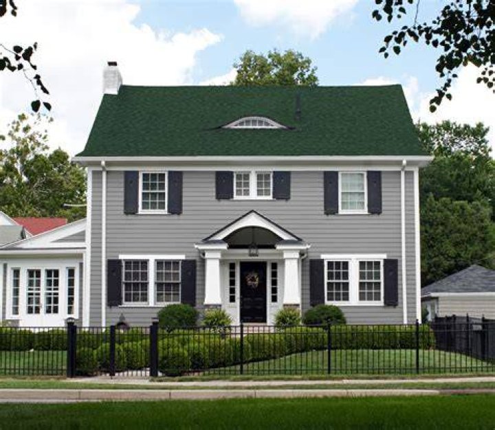 What color do you paint a house with a green roof?