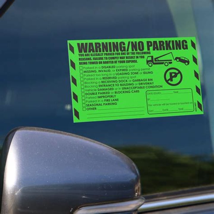 What does a parking violation sticker mean?