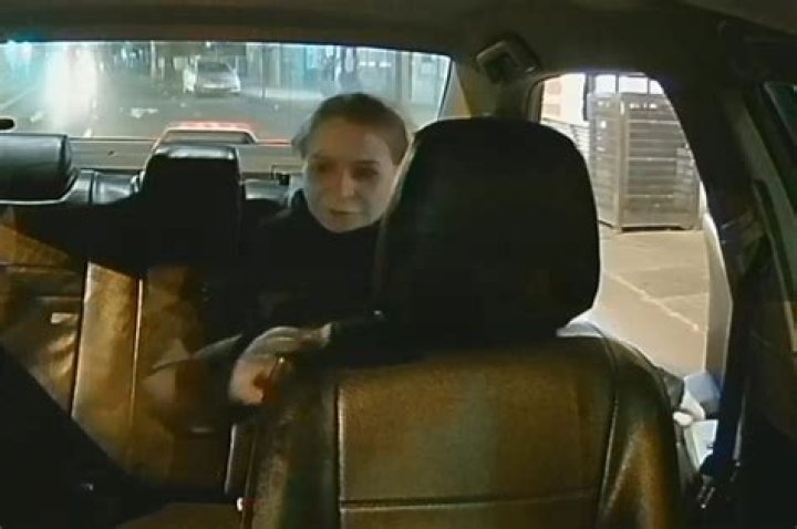 
Woman who carjacked taxi driver at knifepoint captured on video 